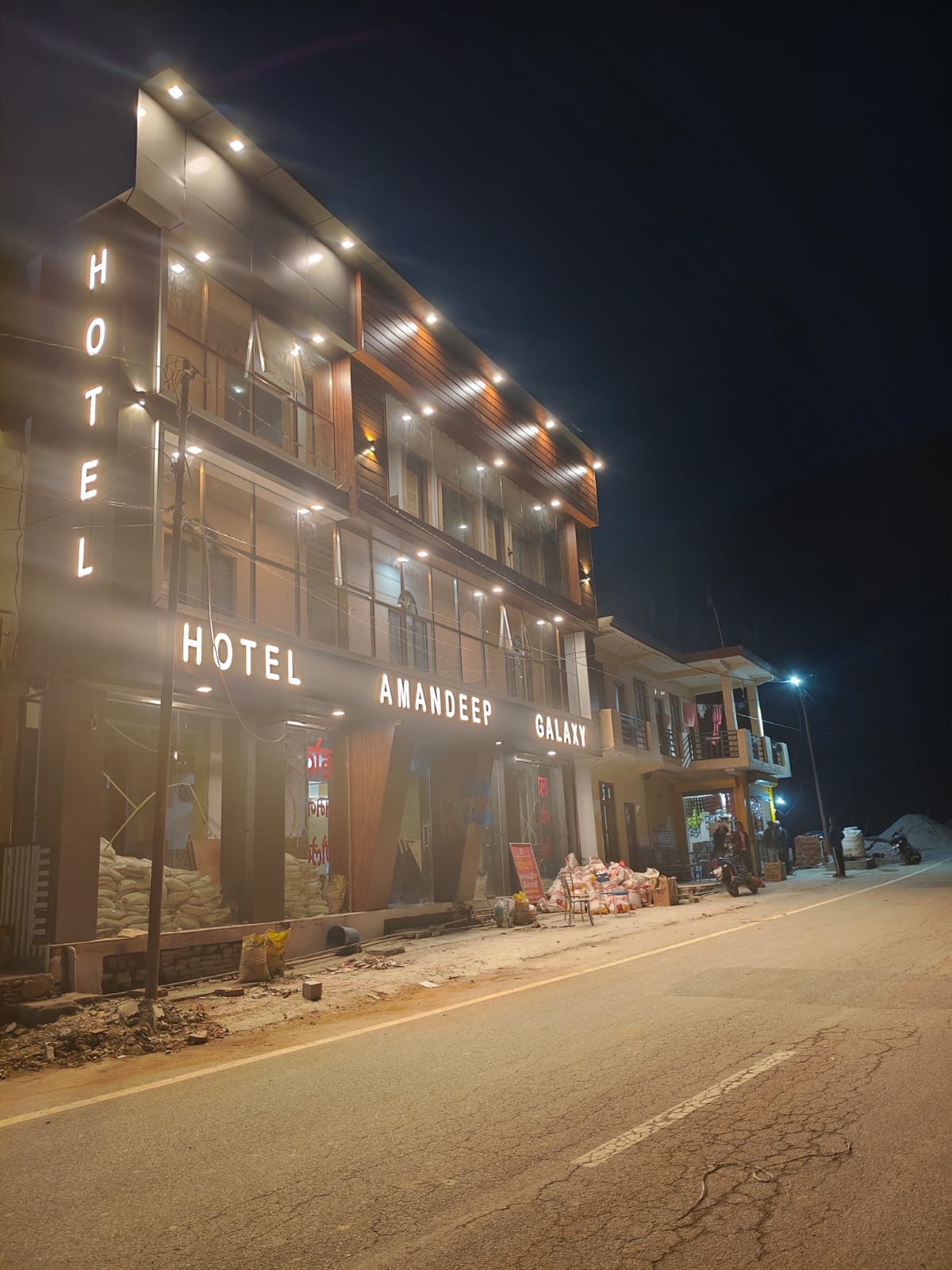 Hotel Amandeep Barkot — building exterior at night